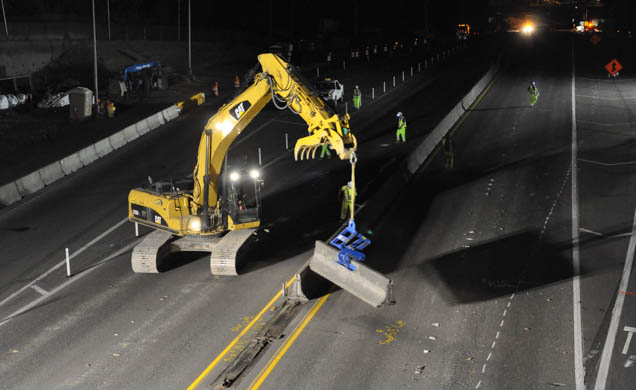"Removing barriers - SR 520 Eastside project night work, August 2011" by Washington State Department of Transportation licensed under CC BY-NC-ND 2.0